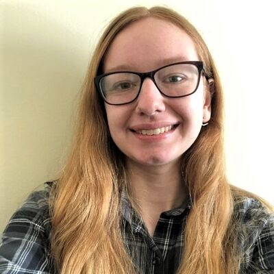 Head shot of Lindsay Jones against a yellow background