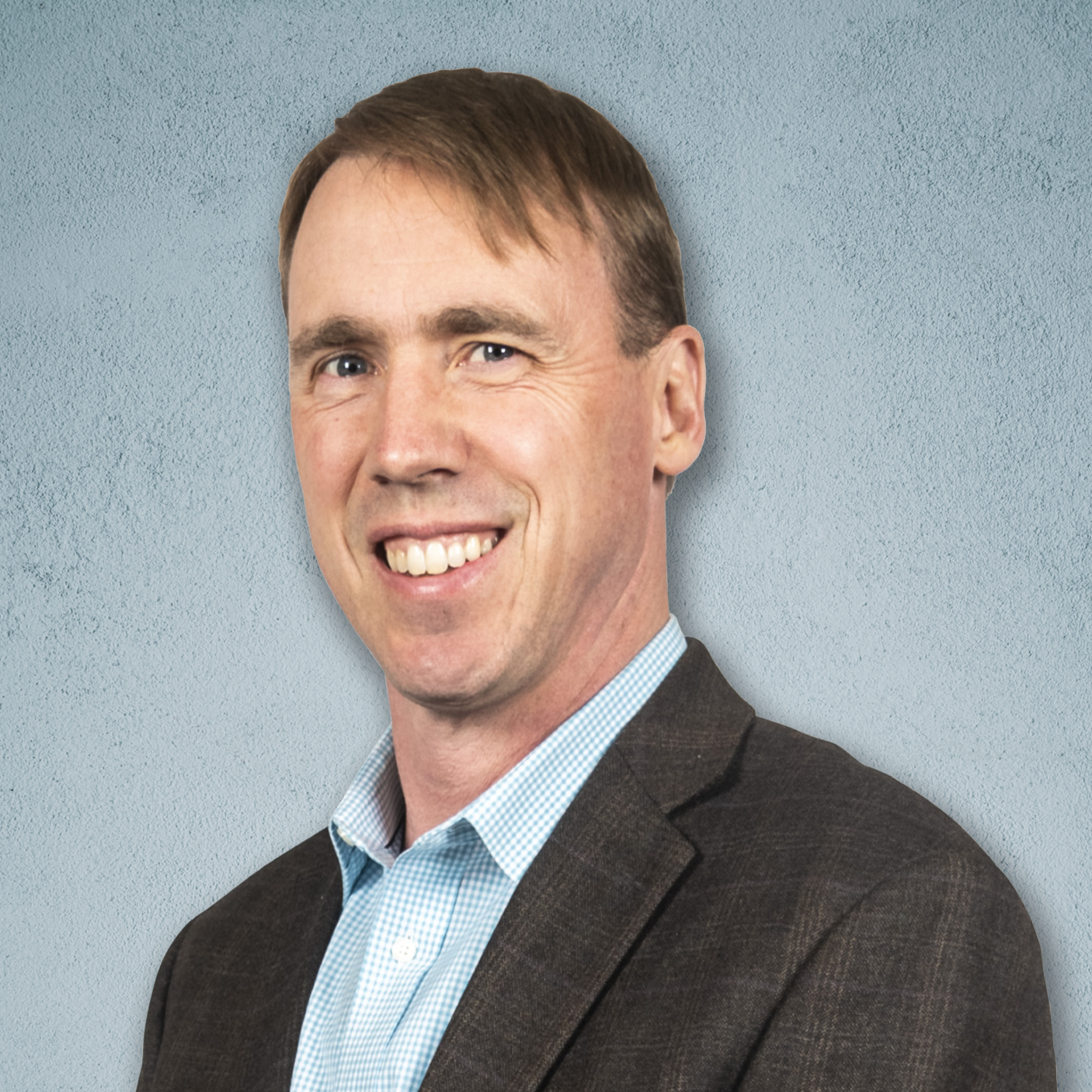 Head shot of Paul Hergenrother on a blue background