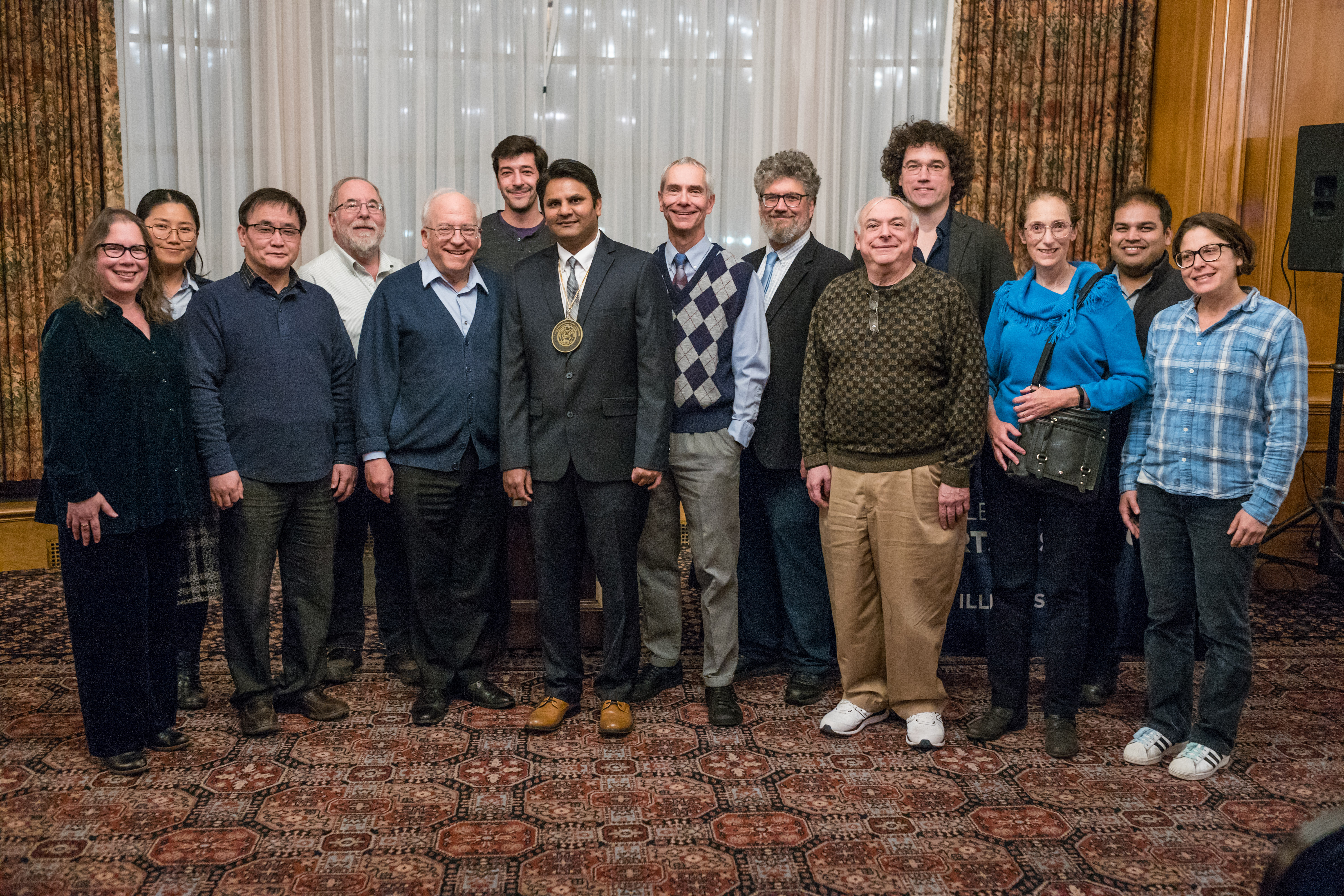 Prashant Jain stands with other members of the chemistry faculty.