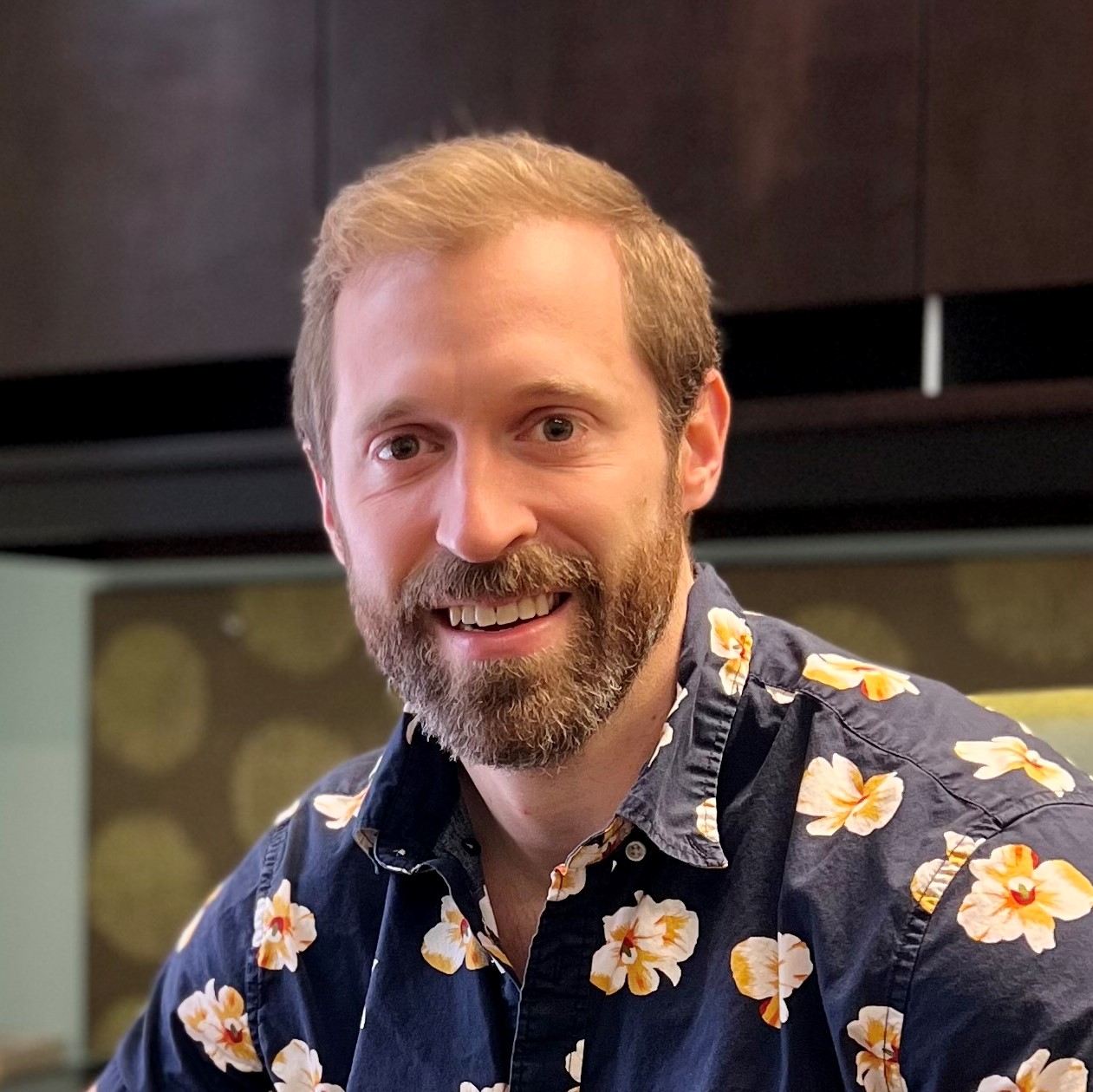 Head shot of Ben Snyder seated in an office