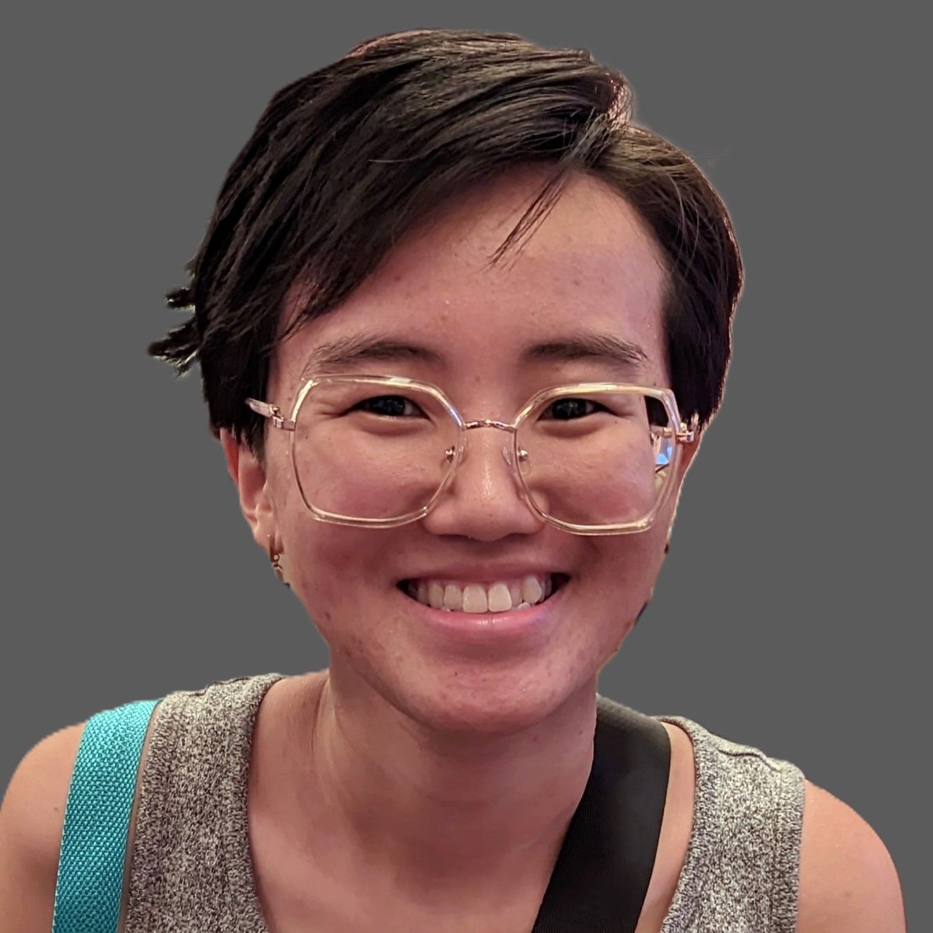 Head shot of Amanda Lam on a dark gray background