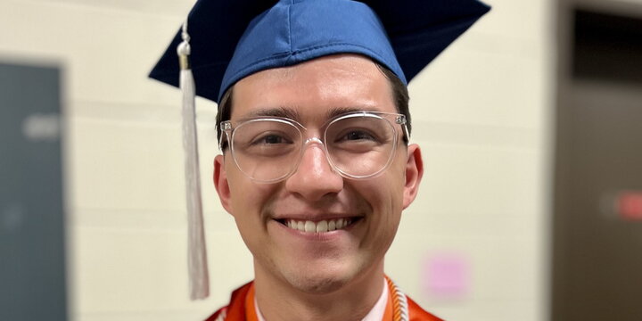 Head shot of Curtis Althaus in graduation cap