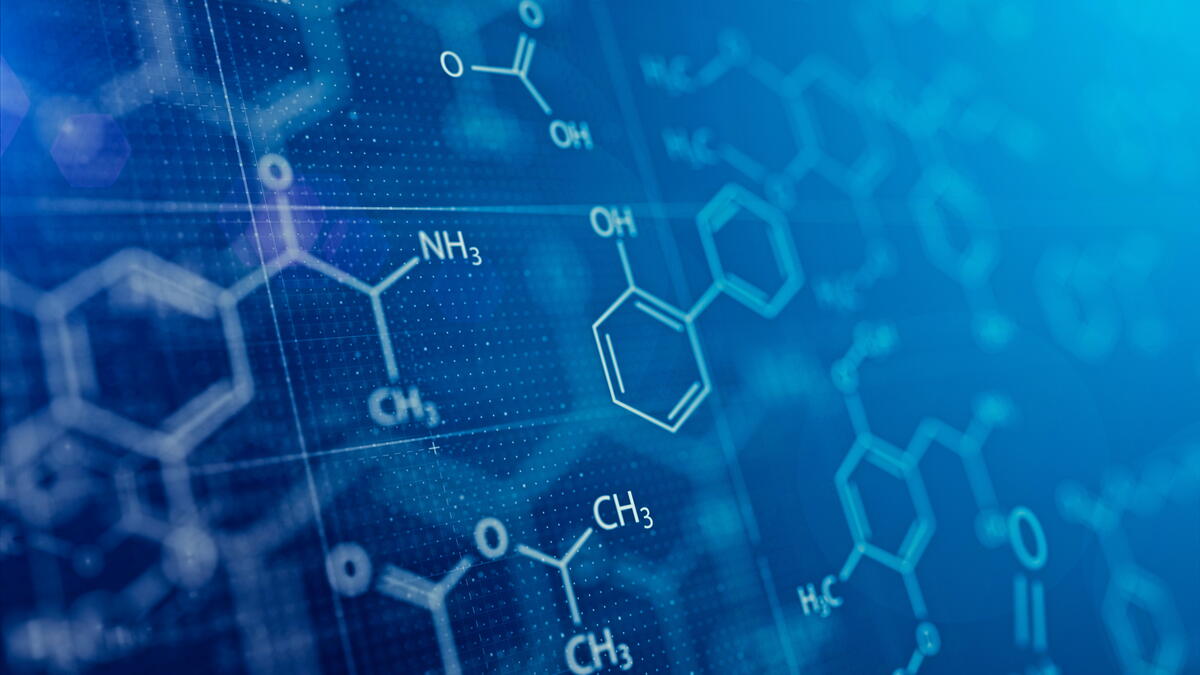 Blue screen showing illustrations of written molecular structures