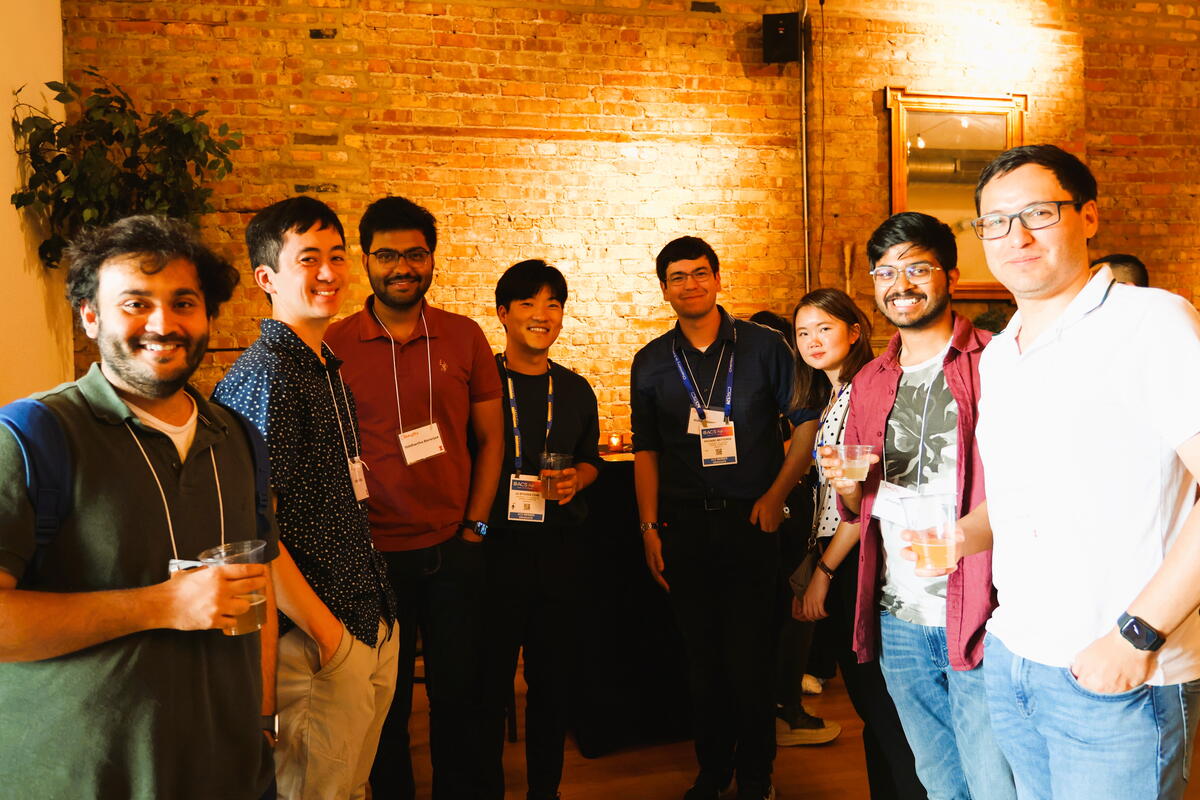 Group of people standing together at a reception