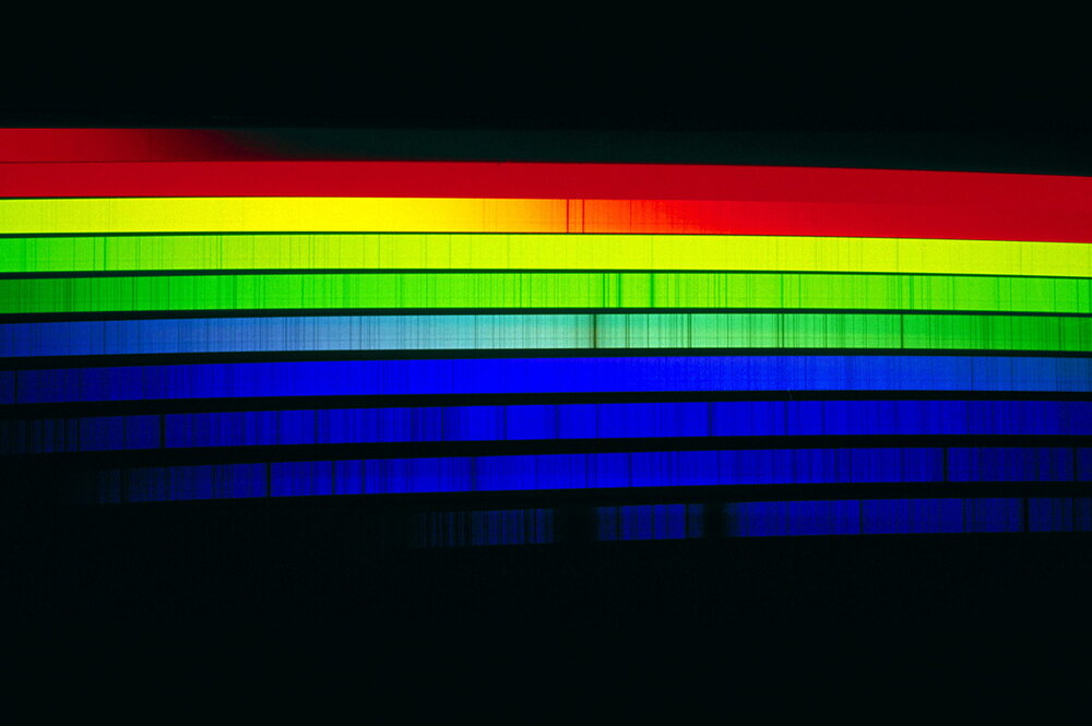 red, yellow, blue lines across a black screen