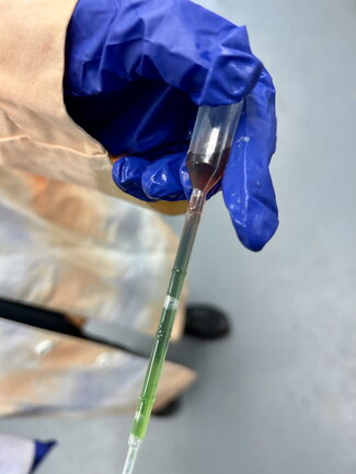 glass tube with colored liquid