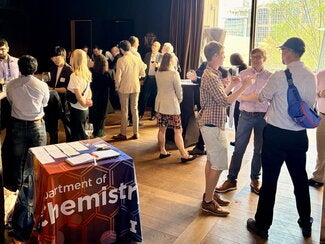 Reception room filled with people talking with each other