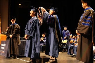 Graduate getting hooded