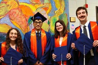 Graduates standing together side by side