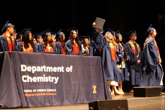 Graduates leaving the stage