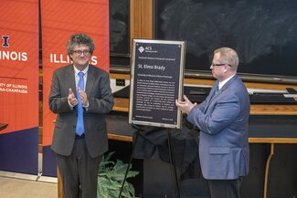 Jonathan Sweedler (Director, School of Chemical Sciences) & Peter Dorhout (2018 President, ACS) applauding the acceptance of the  plaque
