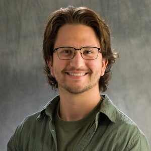 Head shot of Jonathan Haidet on a gray background