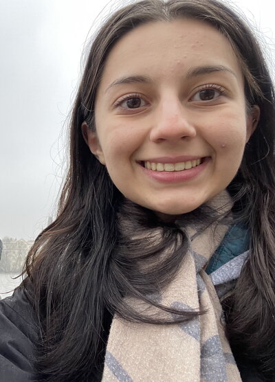 Head shot of Michelle Bishka in a scarf