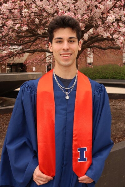 Vito Failla in graduation regalia