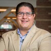 Portrait of a Joaquin Rodriguez Lopez in the atrium of a building