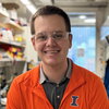Mike Strauss headshot with safety glasses in lab setting