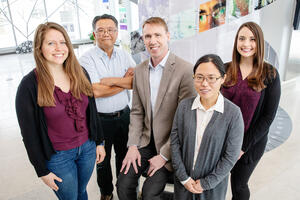 From left, graduate student Emily Geddes, pathobiology professor Gee Lau, chemistry professor Paul Hergenrother, postdoctoral researcher Hyang Yeon Lee, and postdoctoral researcher Erica Parker.  