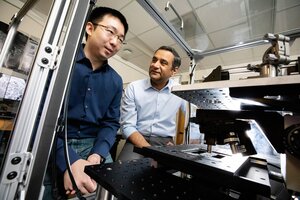 Rohit Bhargava in the lab sitting next to postdoctoral researcher Kevin Yeh, who designed the custom infrared microscope used for this study. This photo was taken in February 2020.
