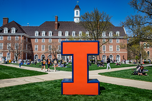 Photo of a Block I with the UIUC Quad in the background.