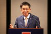 Dr. Hyeon at a podium speaking