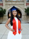 student in graduation regalia