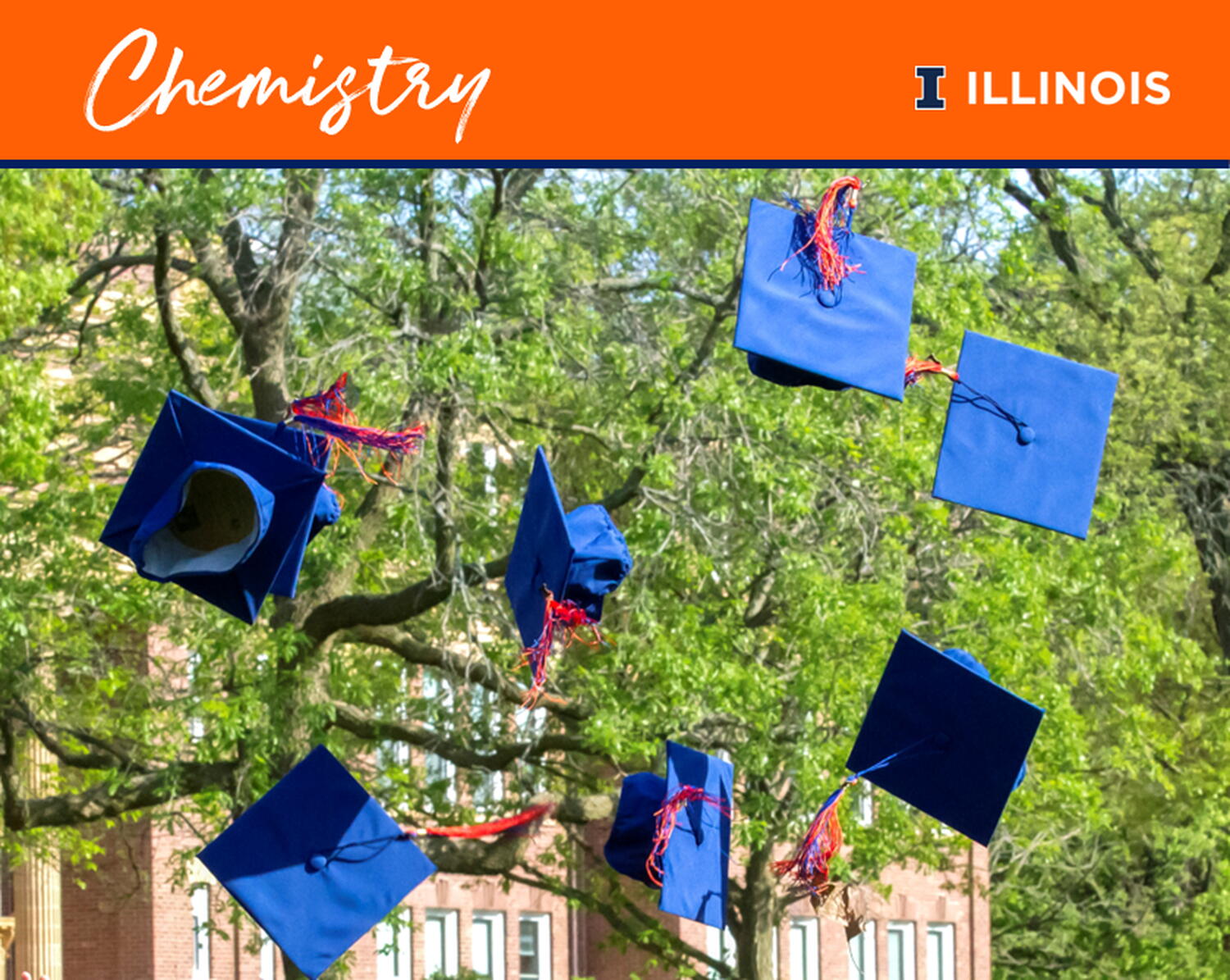 Photo of blue and orange graduation caps tossed in the air