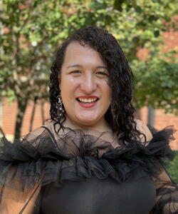 Portrait of Raylene Gomez Hernandez with an outdoor background