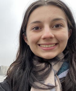 Head shot of Michelle Bishka in a scarf