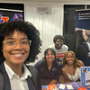 Chemistry students and staff pose at their booth at the NOBCChE conference.