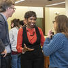 Steven Zimmerman (UI faculty) & Ja'wanda Grant (Xavier University of Louisiana) talking with a student