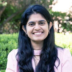 Head shot of Smitha Pillai in an outdoor setting