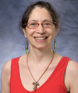 Head shot of Armanda Formigao Gameiro on a gray background