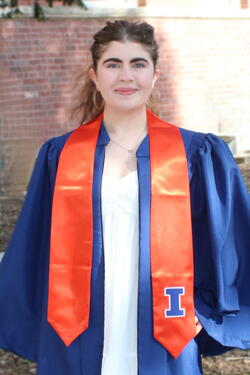 Michaela Klein in a graduation regalia