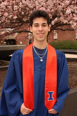 Vito Failla in graduation regalia